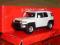 TOYOTA FJ CRUISER kremowa WELLY 1:34